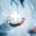 Doctor-holding-up-human-anatomy-and-medical-graphic-front-view-photo-edit
